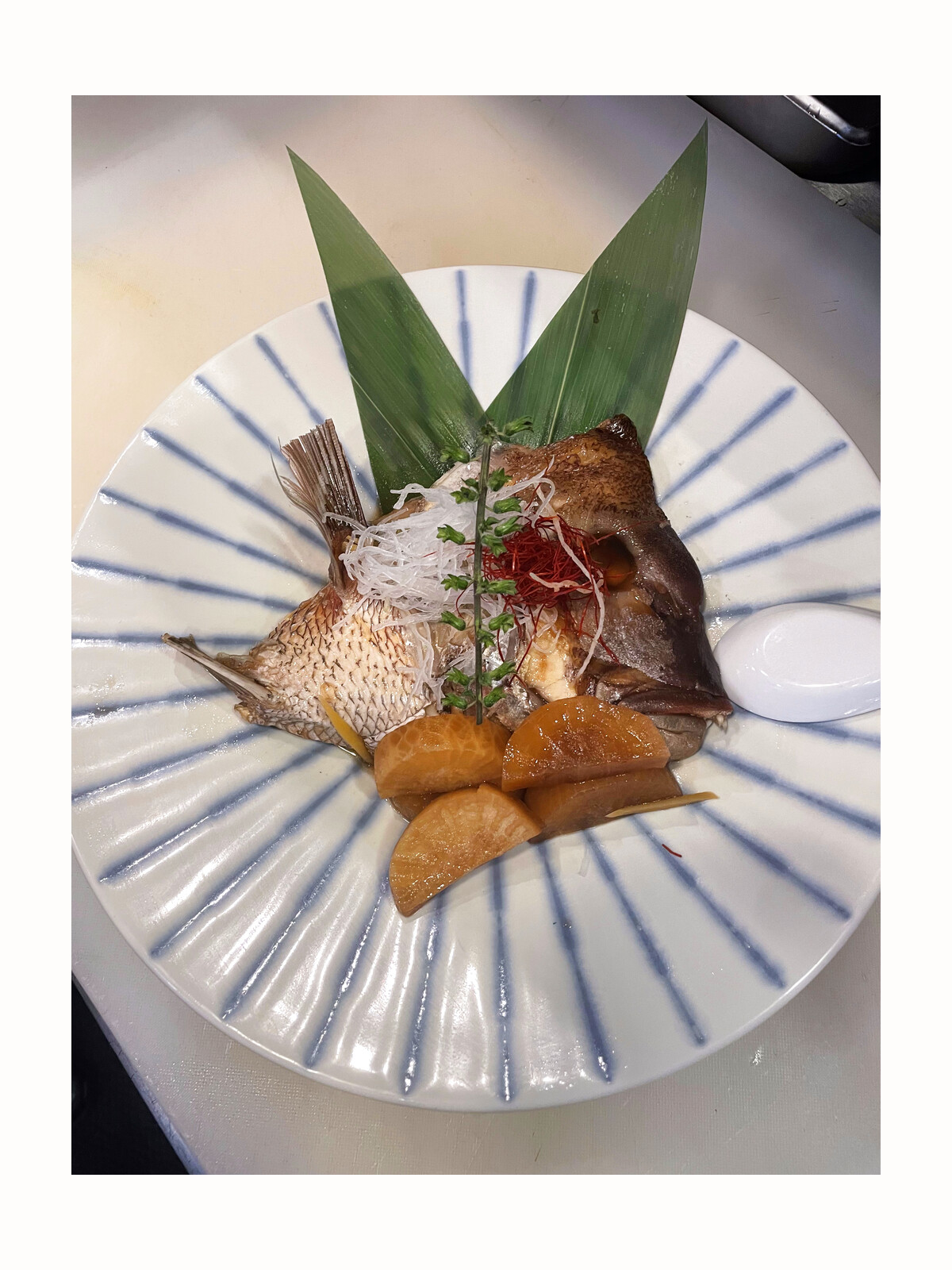 Omakase simmered whole fish course