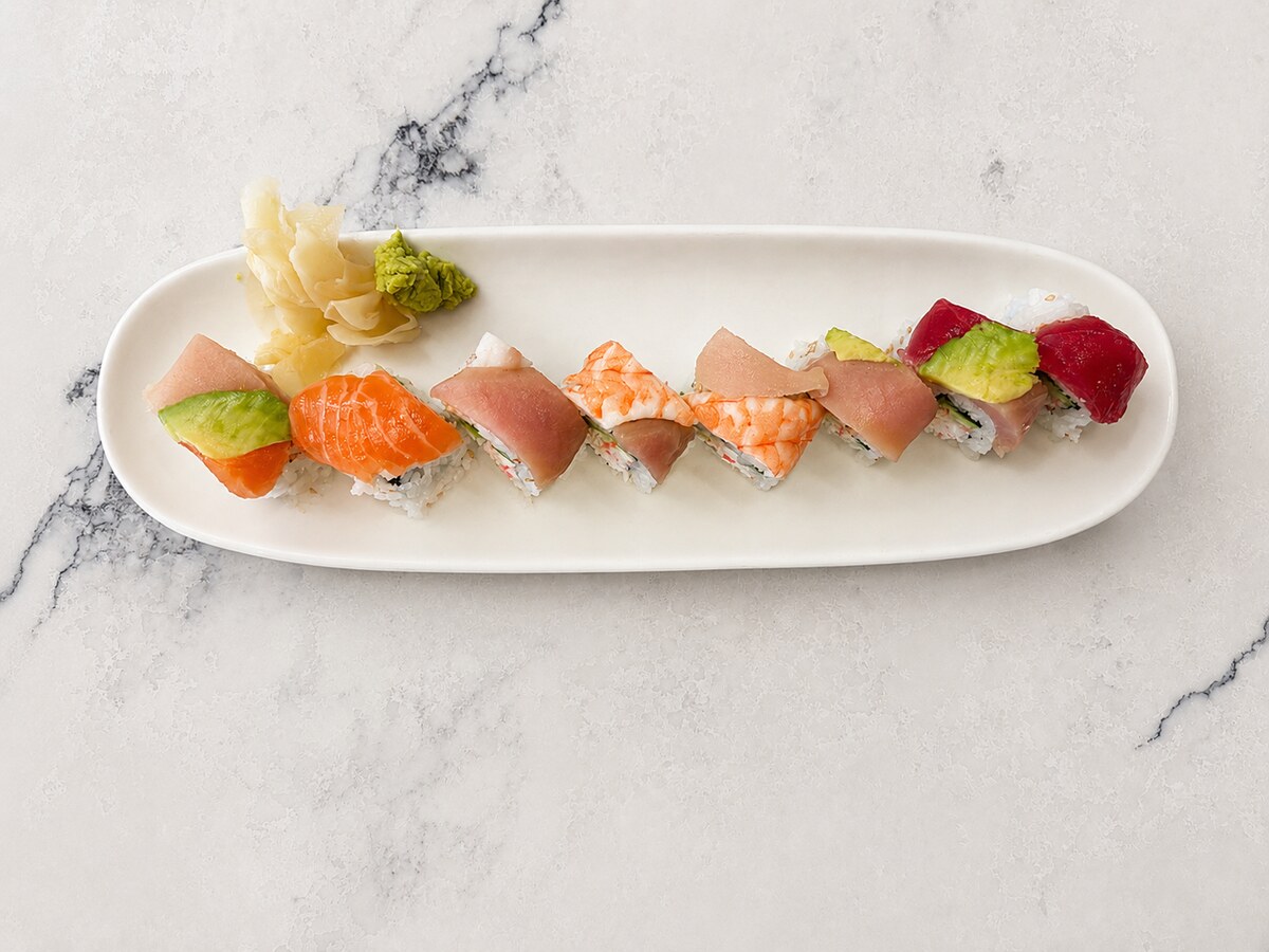 Rainbow Roll platter with assorted sashimi and avocado